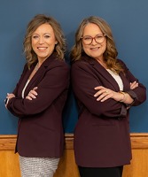 Photo of Amber Groene and Robinn Carr, members of Union State Bank's Treasury Management team.
